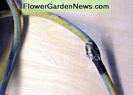 Ein beschädigtes Verlängerungskabel. Entweder ersetzen oder reparieren Sie richtig - werfen Sie nie einfach etwas Klebeband darüber. A damaged extension cord. Either replace or repair properly - never simply throw some tape on it.