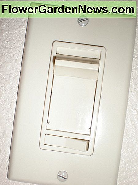 Ein Schieberegler-Dimmer. A slider-type dimmer switch.