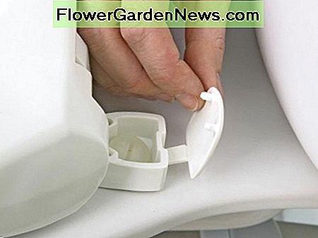 แหวนติดกับแผ่นเซรามิคที่มีสกรูยาวสองตัวและฝาพลาสติก Ring is attached to ceramic pan with two long screws and plastic cap.