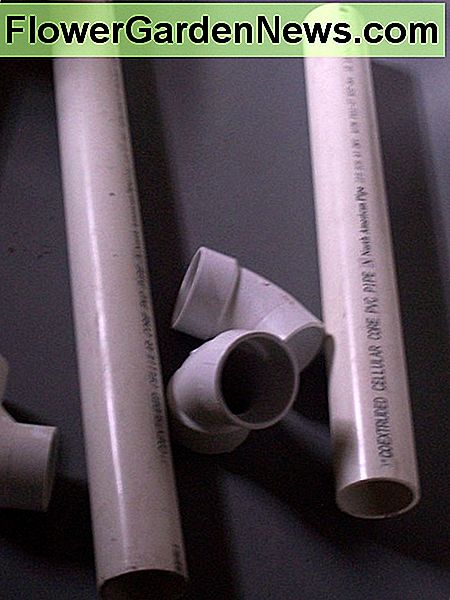 Foto # 8 - PVC rør og fittings bruges til influenza (skorsten) på en høj effektivitet ovn. Photo #8 - PVC pipe and fittings used for the flu (chimney) on a high efficiency furnace.