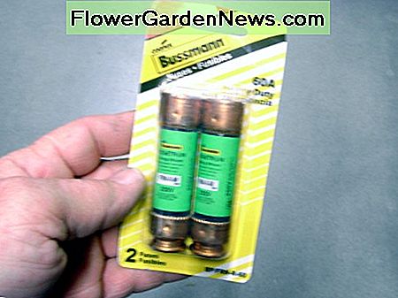 En 60 amp sikring; det er usandsynligt at finde en af ​​disse i et hjem. A 60 amp fuse; it is unlikely to find one of these in a home.