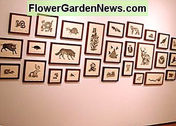 Dit is een mooi arrangement voor een grote muur als je veel frames moet ophangen. This is a nice arrangement for a large wall when you have a lot of frames to hang.