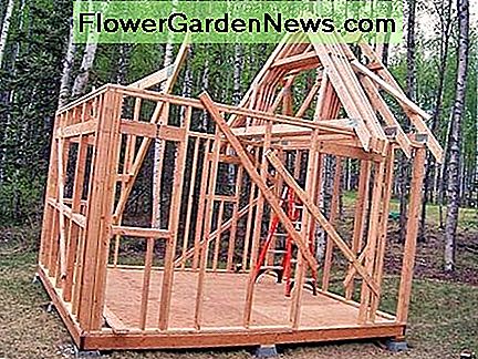 Sobald alle Träger bereit sind, schieben Sie sie über und nageln Sie sie an Ort und Stelle. Once all the trusses are up and ready, slide them across and nail into place.
