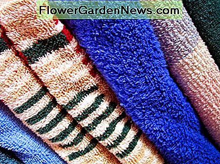 Halten Sie Bettwäsche und Handtücher in Ihrem Ferienhaus. Bild mit freundlicher Genehmigung von Cohdra Keep bed linens and towels in your vacation home. Image courtesy of cohdra